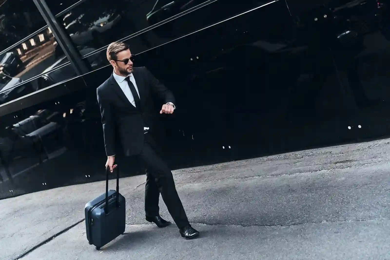 Business traveller preparing for a chauffeur journey
